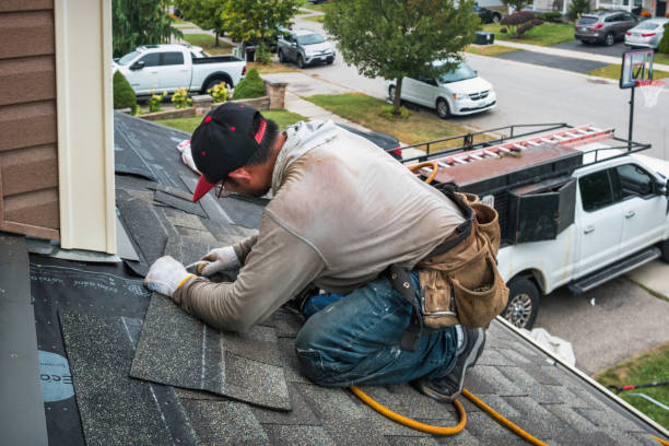 Professional Roof Replacement technician working in Hampton, FL